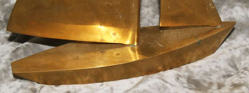 Large brass sailing boat (yacht)