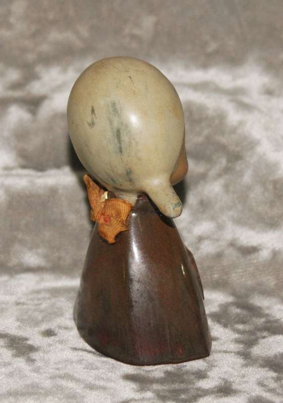 Vintage glazed stoneware girl figurine bell