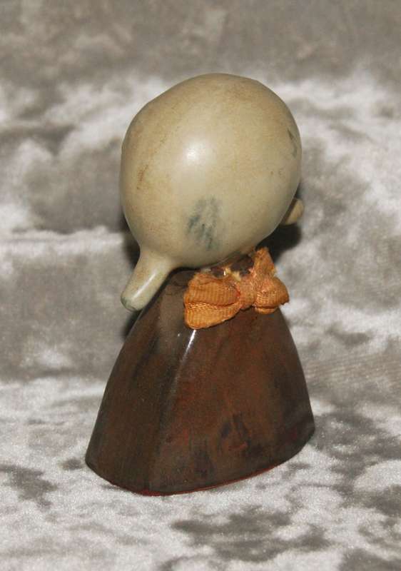 Vintage glazed stoneware girl figurine bell