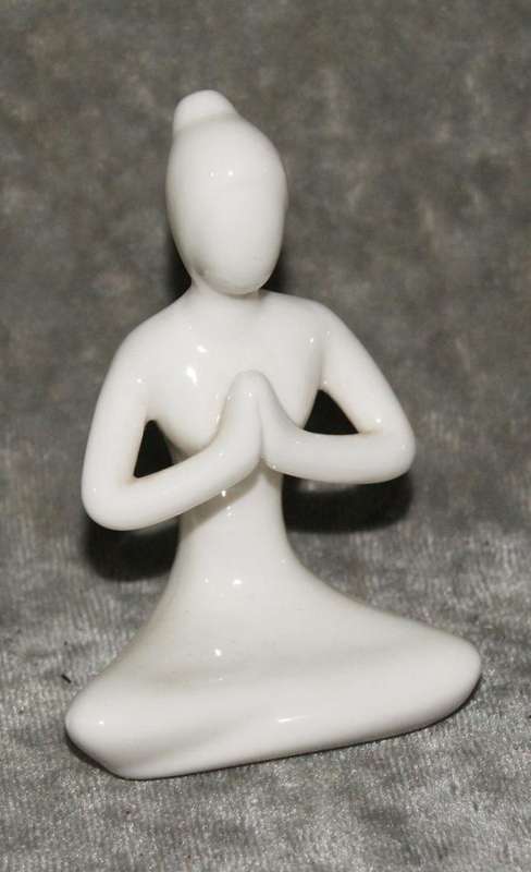 Meditation pose ceramic figurine