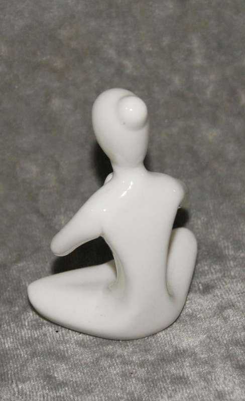 Meditation pose ceramic figurine