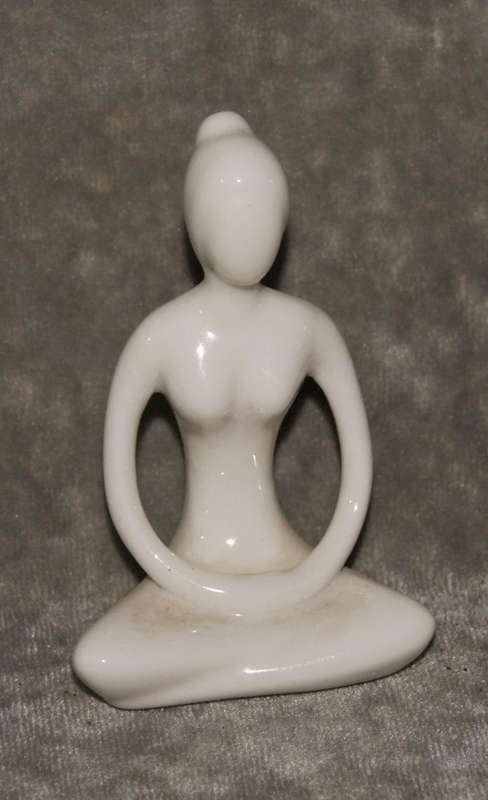 Meditation pose ceramic figurine