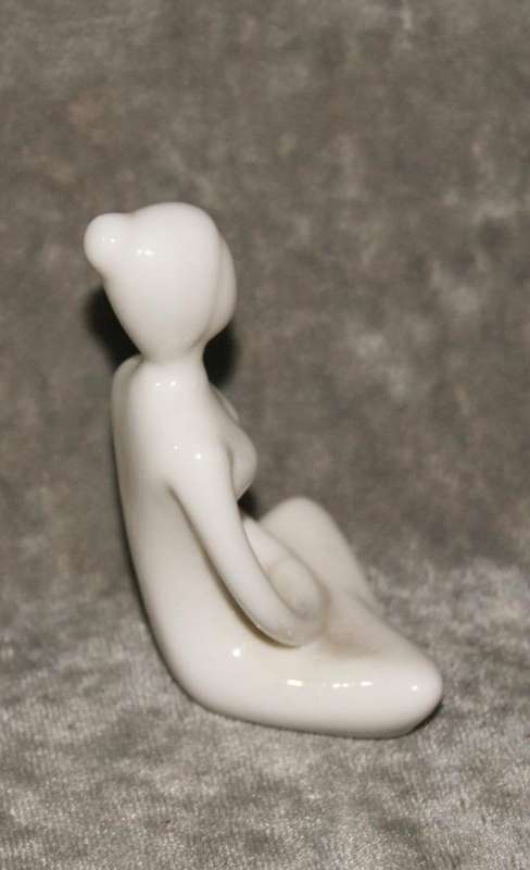 Meditation pose ceramic figurine