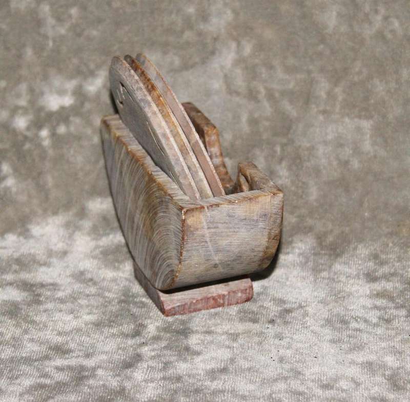 Set of 3 hand carved stone coasters in holder