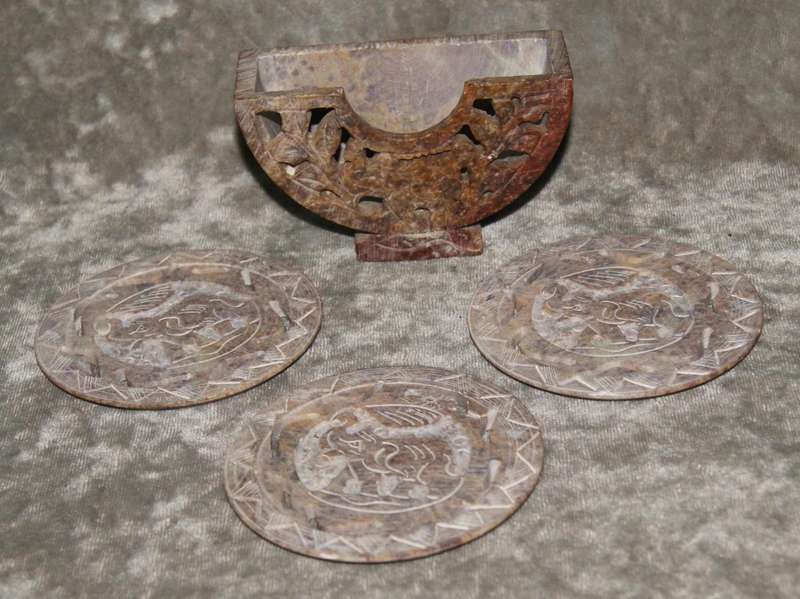 Set of 3 hand carved stone coasters in holder