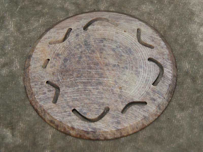 Set of 3 hand carved stone coasters in holder