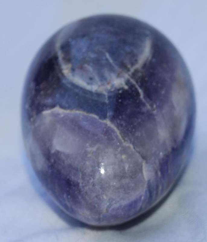 Polished Amethyst egg with brecciated Jasper stand