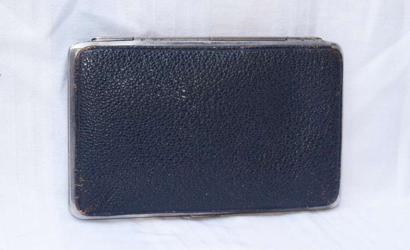 Vintage leather and chrome wallet