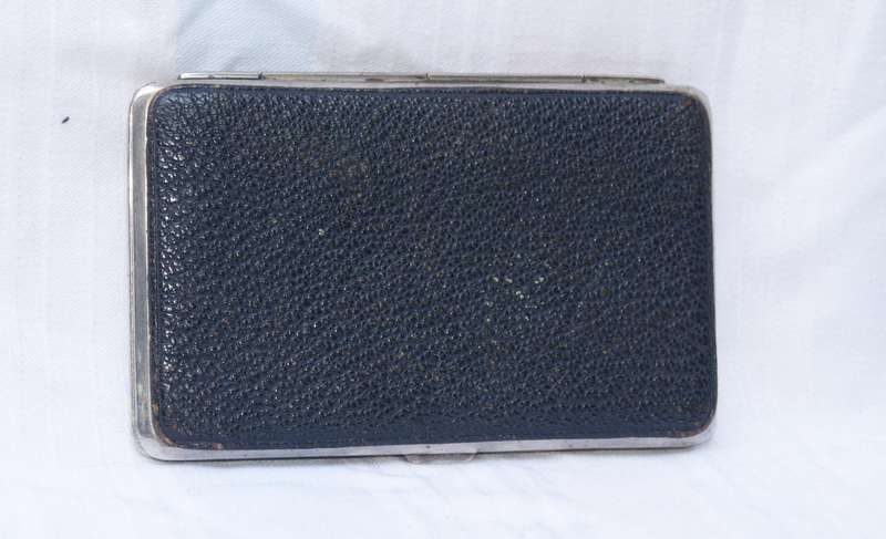 Vintage leather and chrome wallet