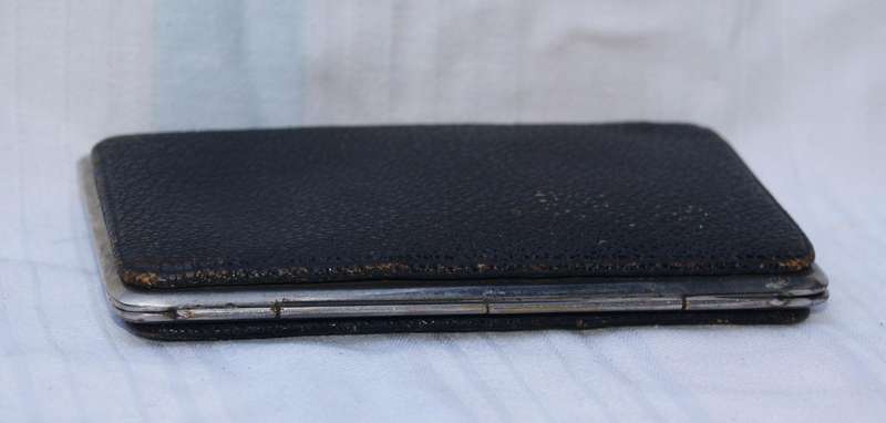Vintage leather and chrome wallet