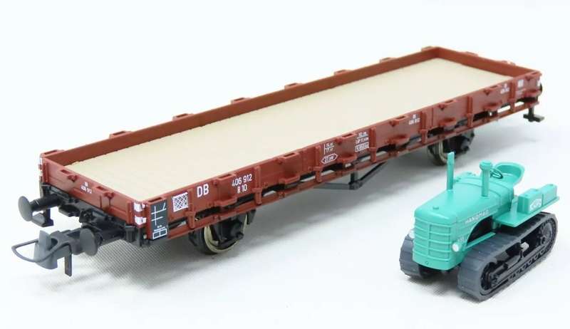 H0 gge 1/87 120mm DB low-side open goods wgn w. Hanomg tractor + rungs, mint in orig.box Roco 47794