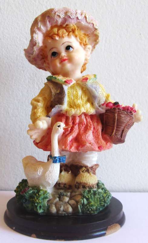 Sweet Girl with her Swan Ornament