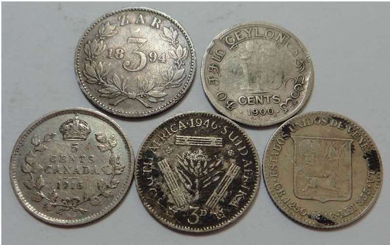 Five Silver three-pence-size pieces incl. ZAR