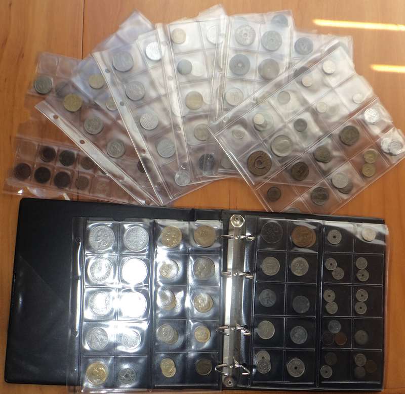 Collection of over 150 World Coins in Album