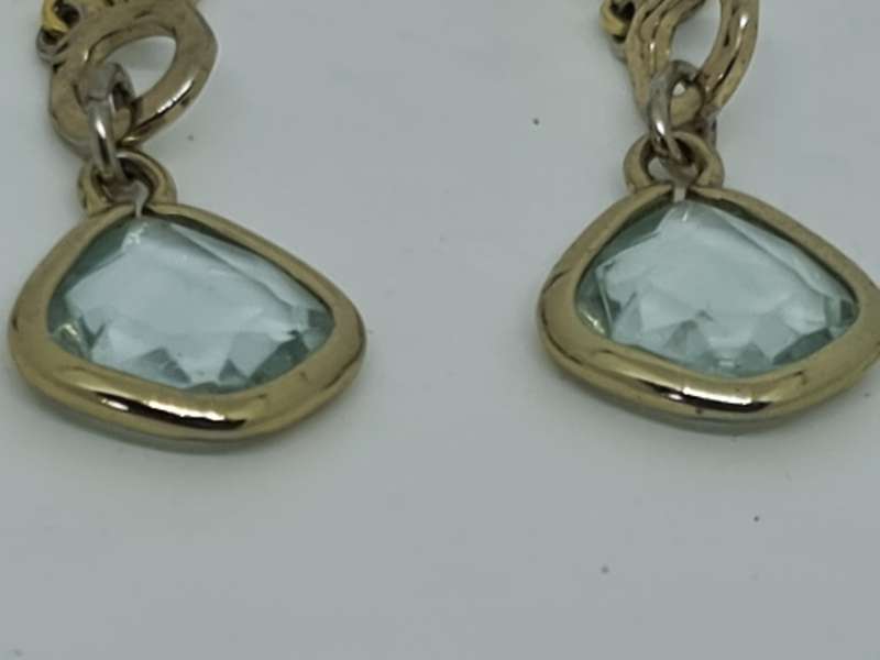 Gold Tone earrings with clear stone