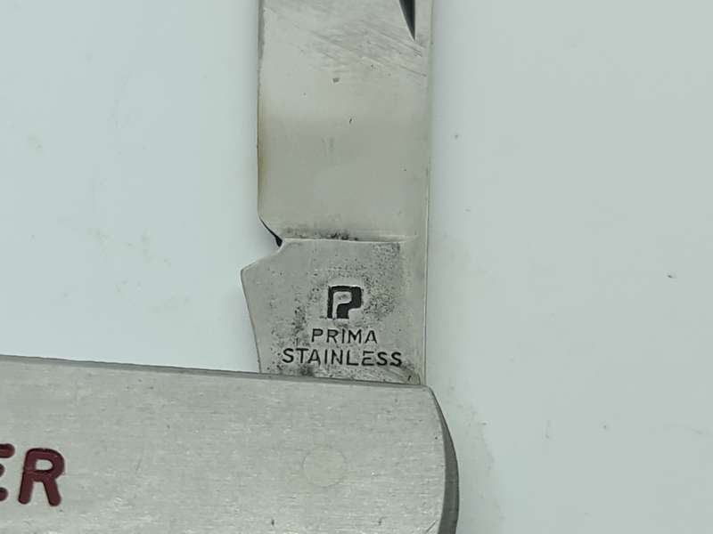 Castle prima stainless pocket knife and opener