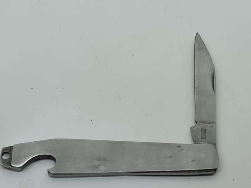 Stainless Hong Kong pocket knife and bottle opener