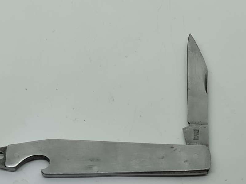 Stainless Hong Kong pocket knife and bottle opener
