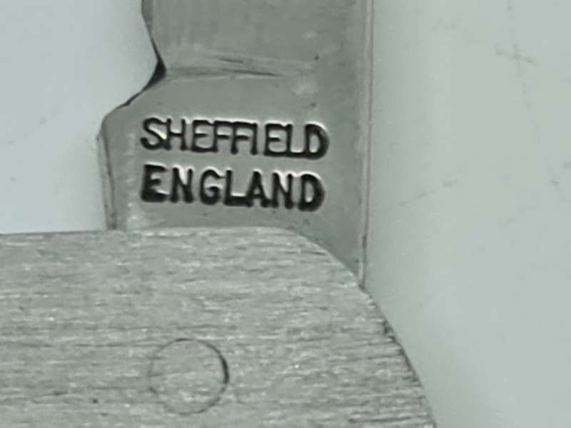 Sheffield England, stainless steel pocket knife with bottle opener