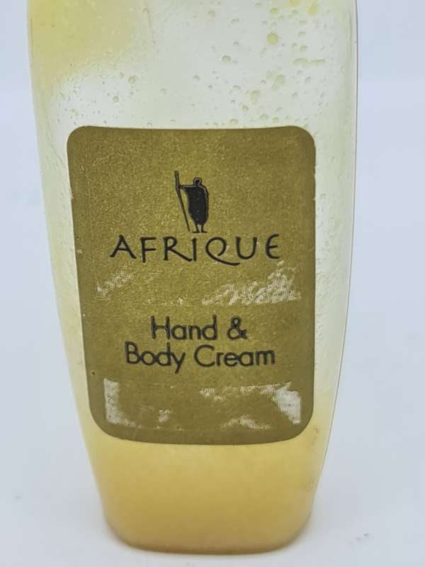 Afrique shampoo and Hand and Body Cream bottles