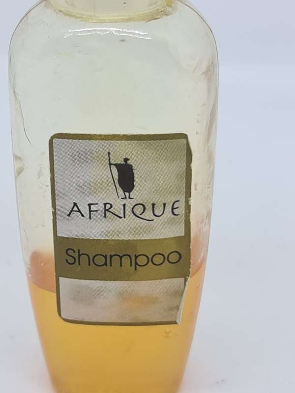 Afrique shampoo and Hand and Body Cream bottles