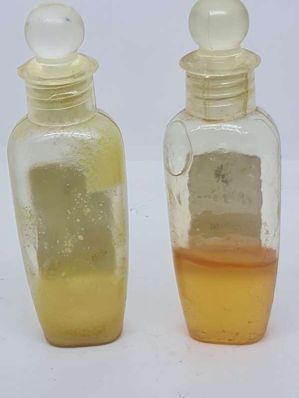 Afrique shampoo and Hand and Body Cream bottles