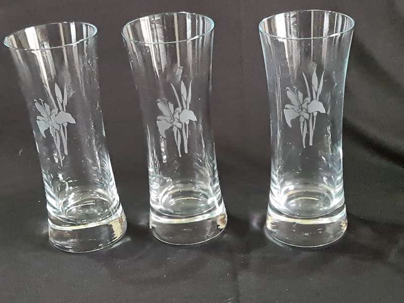 Three vintage tall glasses