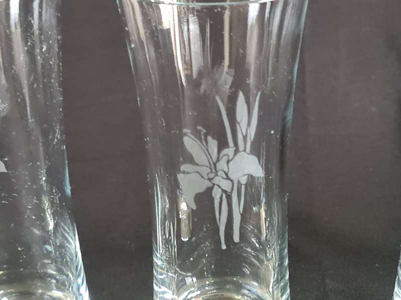 Three vintage tall glasses