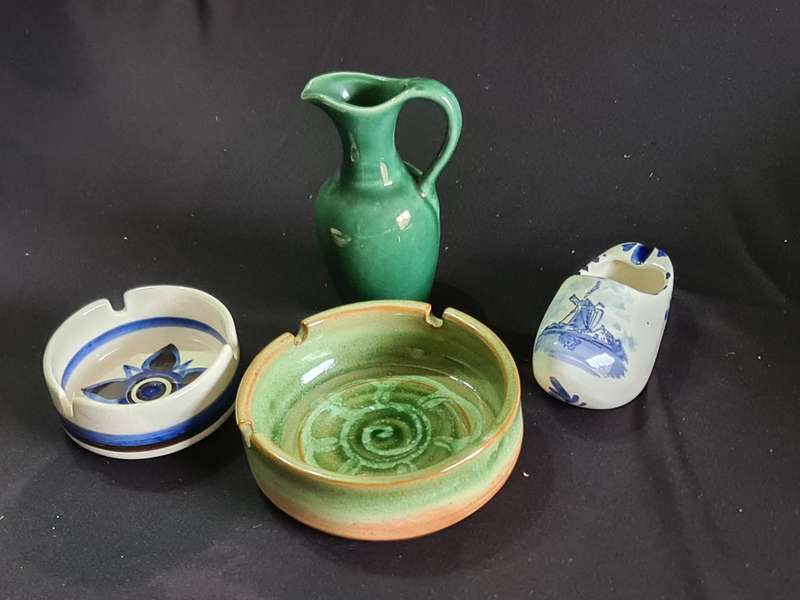 Three ashtrays one Delft and small green jug
