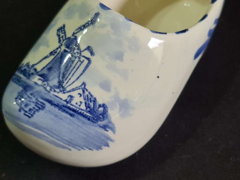 Three ashtrays one Delft and small green jug