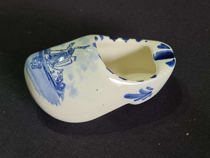 Three ashtrays one Delft and small green jug