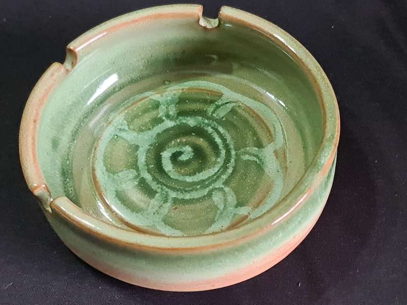Three ashtrays one Delft and small green jug