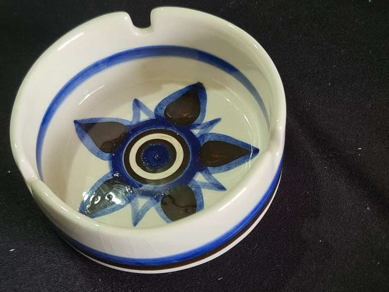 Three ashtrays one Delft and small green jug