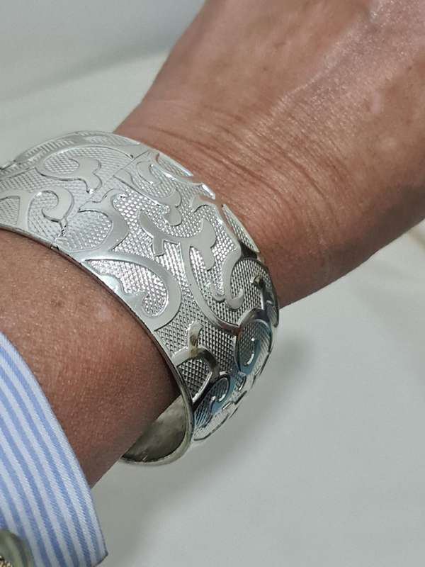 Silver Tone plastic bangle
