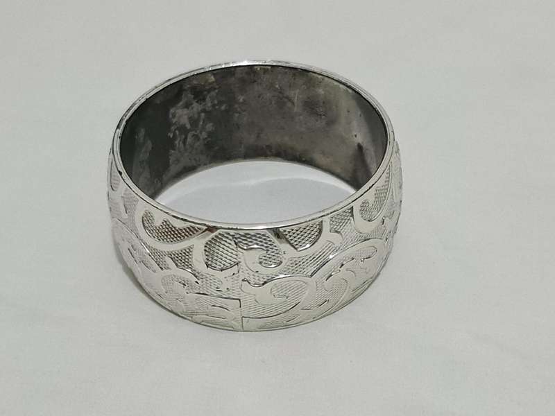 Silver Tone plastic bangle
