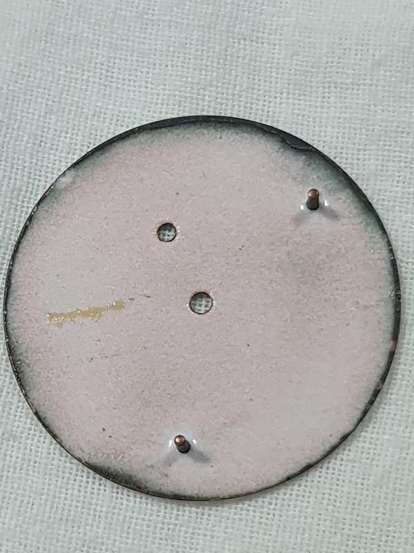 Swiss Made Montbrilliant enamel watch dial.