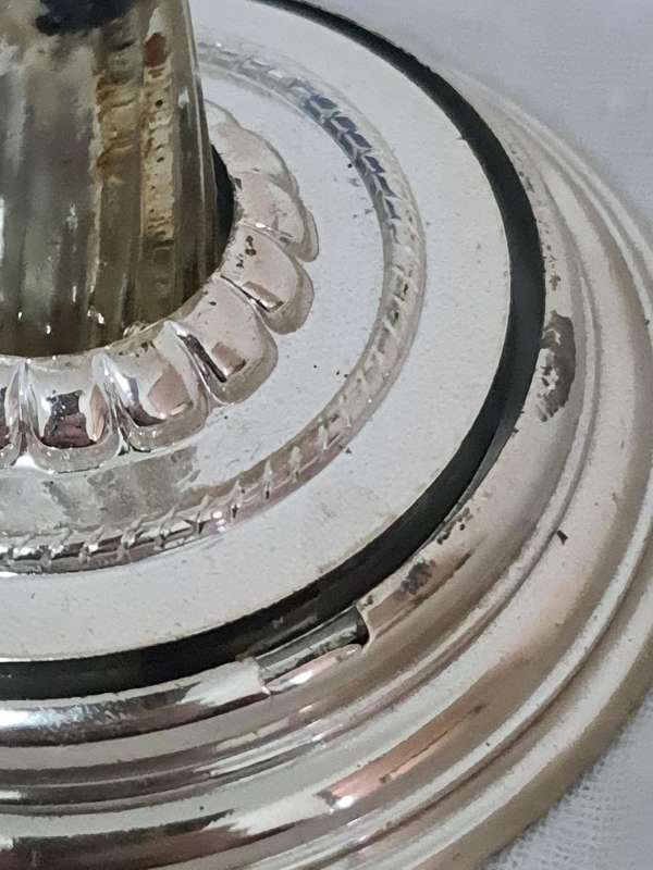 Clock that is not a clock. Small scent bottle inside.  Bottle no lid. Dial damage