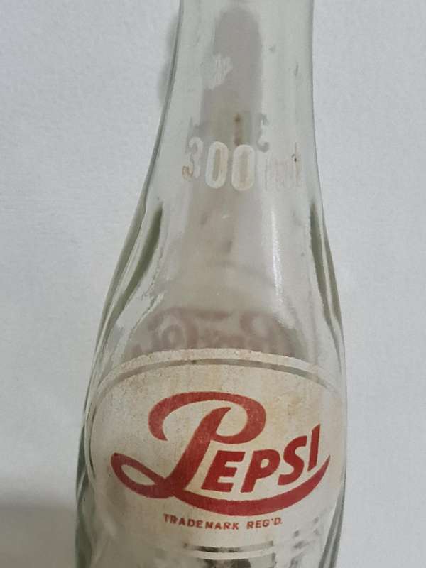 X4 Differant size and age Pepsi Cola bottles.
