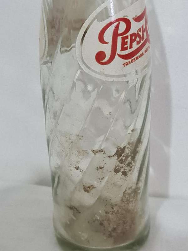 X4 Differant size and age Pepsi Cola bottles.