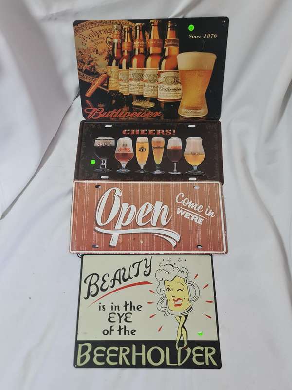 Four Metal signs for a mancave