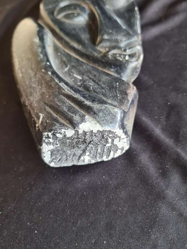 Soap stone carved face