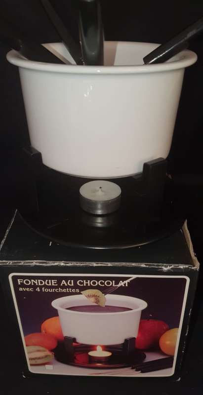 Two Vintage fondue sets