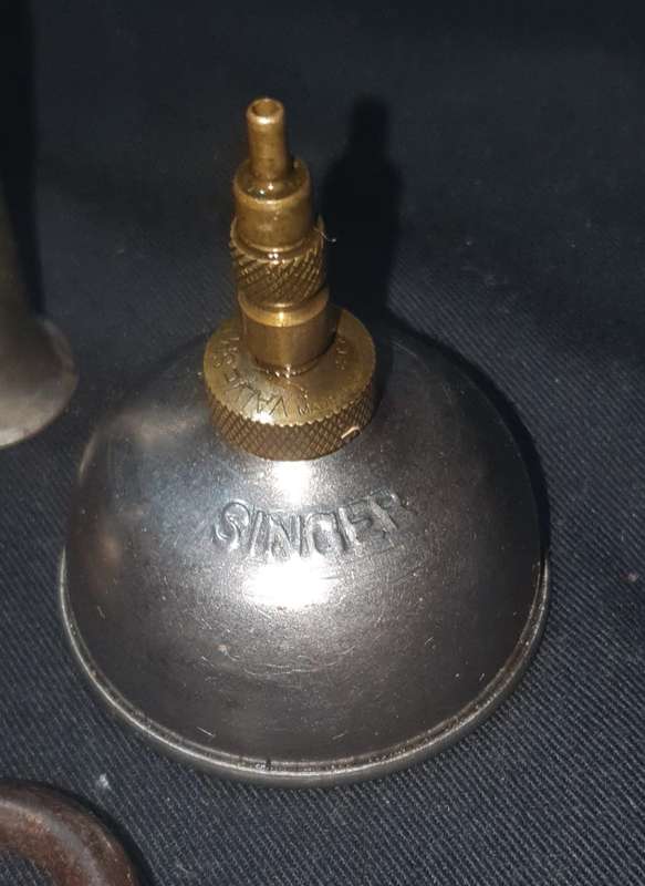 Three oilers one mark singer. Two vintage locks