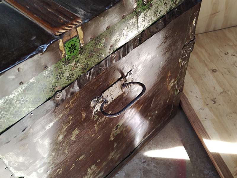 Antique metal steamer trunk