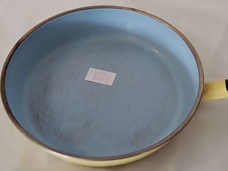 Vintage yellow cast iron pan with lid