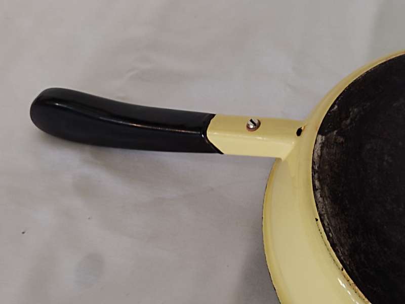 Vintage yellow cast iron pan with lid