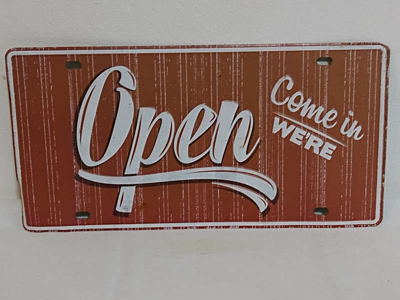 Come in we're open sign