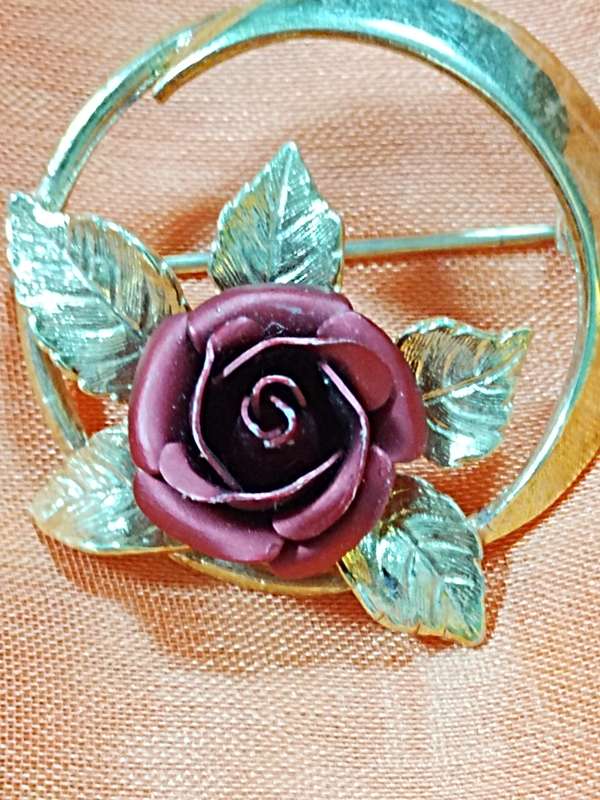 Gold tone with red  rose brooch