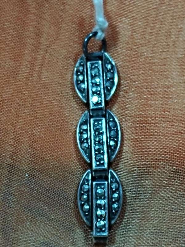 Silver tone marcasite pendant