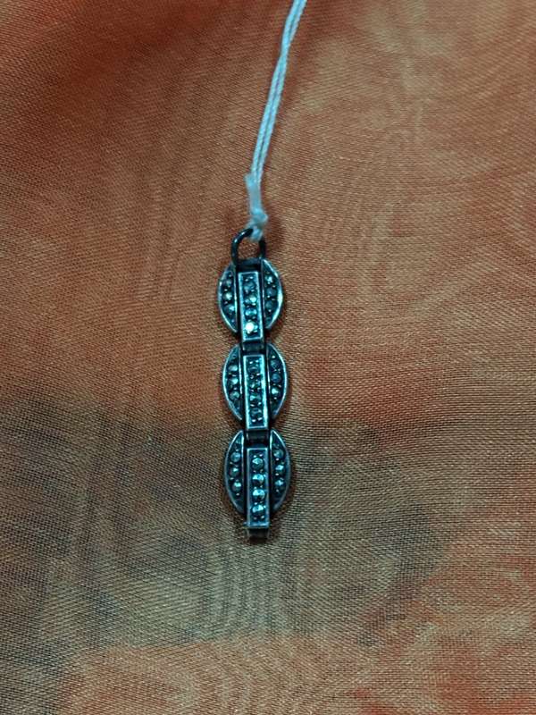 Silver tone marcasite pendant